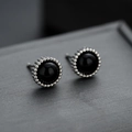 Vintage style silver stud earrings with polished black round stone and beaded edge - Black