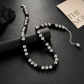 Collana geometrica in acciaio al titanio con perle nere e argento e chiusura a moschettone - Collana di Perle Artificiali Nere con Splicing