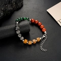 Detail of sandalwood beaded bracelet with diverse natural stone beads and lobster clasp - Green Black Luck Bead Style
