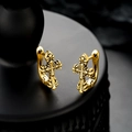 Close-up of vintage gold cross hoop earrings with embossed texture and antique finish - Gold (X848-B)