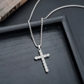 Detail of silver cross necklace with clear crystals on retro book and black leather - Simple Rhinestone Cross (L8888-J)