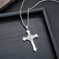 Macro detail of silver cross necklace with inlaid rhinestones and retro metal texture - Layered Cross (L8888-I)
