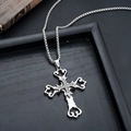 Detailed macro view of silver cross pendant with white zircon stones on a box chain - Crown Cross (L8888-G)