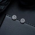 Macro shot of vintage sun and eagle pattern on gunmetal stud earrings for men - Eagle Sun Style / Gunmetal