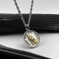 Macro detail of retro coin pendant necklace with golden praying hands and Latin engraving - Praying Hands (L270-A)