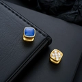Detailed view of Tibetan style square earrings with blue enamel and sparkling white crystals - Gold Base Blue