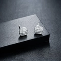 Macro view of square silver earrings featuring geometric grid texture on black background - Square Prism Style (X753-C) / Silver