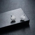 Macro shot of silver prism geometric earrings with textured pattern on a black stand - Round Prism Style (X753-A) / Silver