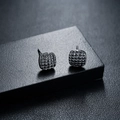 Macro detail of gunmetal square stud earring with textured 3D geometric grid pattern - Square Prism Style (X753-D) / Gunmetal