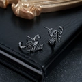 Detailed close-up of scorpion-shaped stud earrings in a vintage dark metal finish - Scorpion (X598-B) / Gunmetal