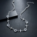Close-up of silver chain necklace with irregular zircons and four-pointed stars detail - Four-Point Star Bubble Irregular Necklace (L836-A)