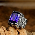 Gothic punk men's stainless steel ring with deep blue gemstone on natural wood bark - US 7 / Steel Color Blue Gemstone