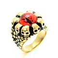 Gothic punk gold ring featuring red dragon eye stone surrounded by five skulls - US 7 / Gold (Red Eyes)
