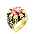 Gothic punk gold skull ring featuring a realistic purple devil eye center stone - Gold Orange Eye