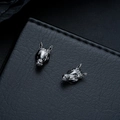 Detailed view of horse head earrings with black electroplated finish and fine engraving - Clip-on Earrings / Gunmetal Black Pair (Clips)