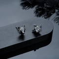 Close-up of wolf head stud earrings with gunmetal finish and detailed fur texture - Gun Black (X1028-B)