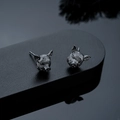 Detailed close-up of dark gunmetal pig head studs featuring intricate carved textures - Stud Earrings / Gun Black Stud Earrings (Pair)