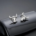 Detailed close-up of silver ox head stud earrings with vintage oxidized finish details - Ox (Silver)