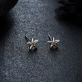 Close-up of star stud earrings with silver base and gold star center on stone - X1060-C (Star Stud) / Silver-Gold Mix