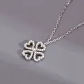 Collana quadrifoglio in argento S925 con petali a cuore e pavé di zirconi luccicanti - Oro Bianco