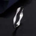 Minimalist 925 sterling silver irregular wave ring with a polished metallic finish - US 6 / Silver