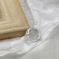 Polished S925 sterling silver knot ring featuring a modern interlaced double band design - US 6 / White Gold