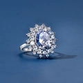 S925 silver ring featuring a large oval clear center stone with double halo sunflower design - Ring Size 6