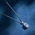 Elegant 925 silver necklace with an oval-cut gemstone pendant and shimmering micro-set stones - Necklace