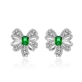 Elegante zilveren strik oorknopjes met smaragdgroene steen en witte zirkonia accenten - 925 zilver / Smaragdgroene oorknopjes