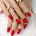 Matte red almond-shaped long press-on nails shown on elegant hands with gold rings. - Cdj-8-500