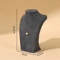 Rose gold clover necklace with white shell inlay on a grey mannequin display stand - 20cm Height / Dark Gray Velvet