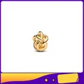 Charm noeud doré poli pour bracelets DIY avec un design métallique entrelacé en 3D - Style de Nœud Torsadé Doré (1)