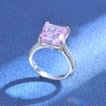 Pink radiant cut gemstone ring in silver finish with side pavé diamonds on blue base - US 7 / Pink