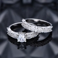 Elegant 925 sterling silver bridal ring set with round main stone and pavé accents - US 6 / Silver Ring Set