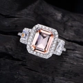 S925 Silberring mit roségoldenem Schmuckstein im Smaragdschliff und Halo-Verzierung - US 7 / Champagner