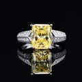 Elegant 925 silver ring featuring a large radiant cut yellow gemstone and pavé diamonds - US 6 / Yellow Diamond