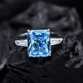 Blue radiant cut 10.5ct carbon diamond three-stone ring in 925 sterling silver finish - US 6 / Light Sea Blue