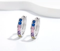 Macro detail of 925 silver hoop earrings with pavé set colorful rainbow cubic zirconia - 925 Silver / Large Round - Silver