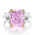 Three-stone ring with pink radiant cut center stone and trapezoid side gems in silver band - US 6 / Light Pink