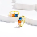 Gold hoop earrings with colorful rectangular zircons on minimalist white display - 925 Silver / Gold