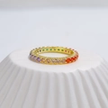 Eternity ring in golden finish featuring rainbow colored zircon stones on a white stand - US 6 / Gold (2mm Rainbow Zirconia)