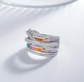 Macro detail of wide sterling silver ring featuring colorful gemstones and pave zircon - US 6 / Silver Rainbow Zirconia