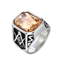 Macro detail of Freemason ring featuring a large champagne gemstone and G emblem on steel - Steel Peach