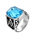 Macro detail of Freemasonry silver ring featuring blue gemstone and side G emblem - Silver Color Coral Blue Gem