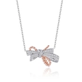 Collana a fiocco in argento S925 con pavé di cristalli e dettagli in oro rosa vista dall'alto - Argento & Oro Rosa