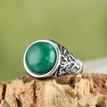 Detail of vintage silver ring with green gemstone on natural wood bark texture - US 7 / Silver Green Gemstone