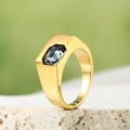 Macro view of gold zircon ring with rectangular black gemstone on stone surface - Gold Color With Grey Rhinestone
