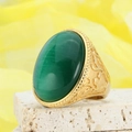 Vintage gold ring with oval green cat-eye stone and intricate floral engravings - Gold Green