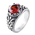 Detail view of a vintage stainless steel ring with a large round red gemstone and carvings - US 7 / Silver Red Zircon