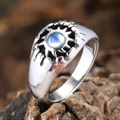 Vintage unisex ring with moonstone sunburst design on dark wood background - US 7 / Silver Blue Rhinestone